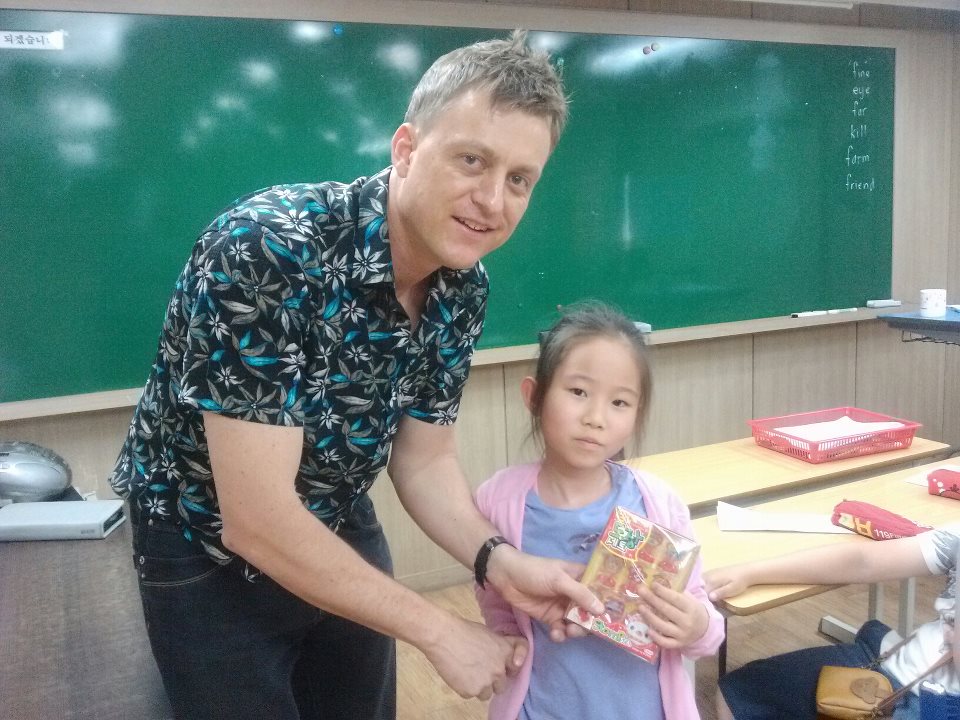 Jarod with Jessica, the best student on the Goldenbell Quiz from B1 class.